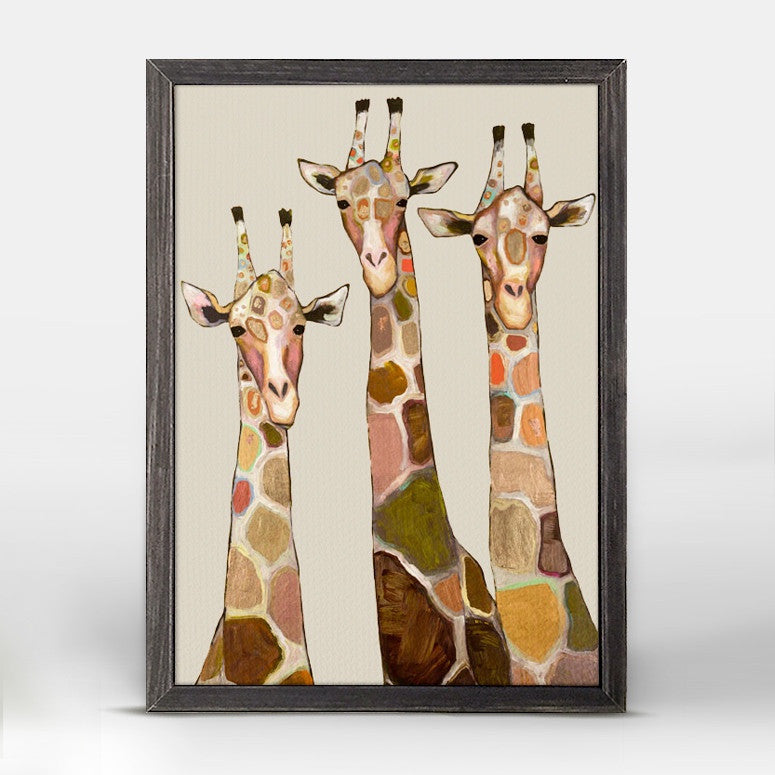 A trio of strikingly beautiful giraffes grace this art by Eli Halpin. Creative and captivating, this modern giraffe design displays unique touches of color along their long, patterned necks. Combine several pieces from Eli Halpin's nature collection for an unforgettable contemporary wall collage in your home.