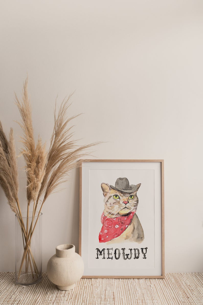 The cowboy cat was created using hand painted watercolor illustrations by Kathy Phan from kathyphantastic.