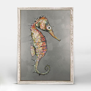 Floating Seahorse in Silver Mini Framed Canvas Print by Eli Halpin