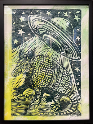 Armadillo Abduction w/ Green Watercolor Background Framed Print by Brunky Art