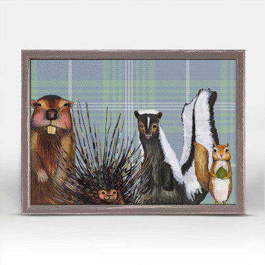 Miss Skunk and Crew on Plaid Framed Print by Eli Halpin