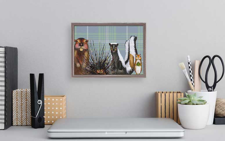 Miss Skunk and Crew on Plaid Framed Print by Eli Halpin