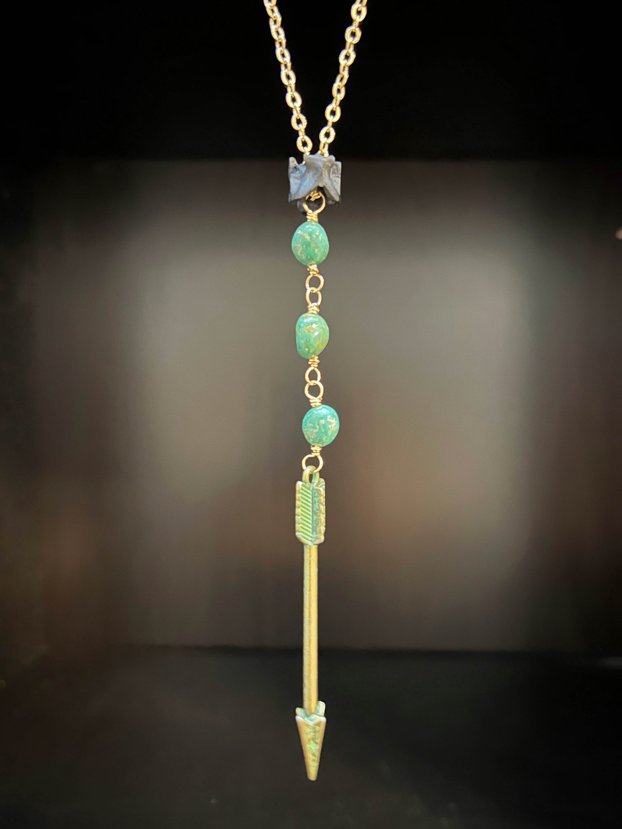 Arrow with Turquoise and Snake Vertebrae Necklace by Pake