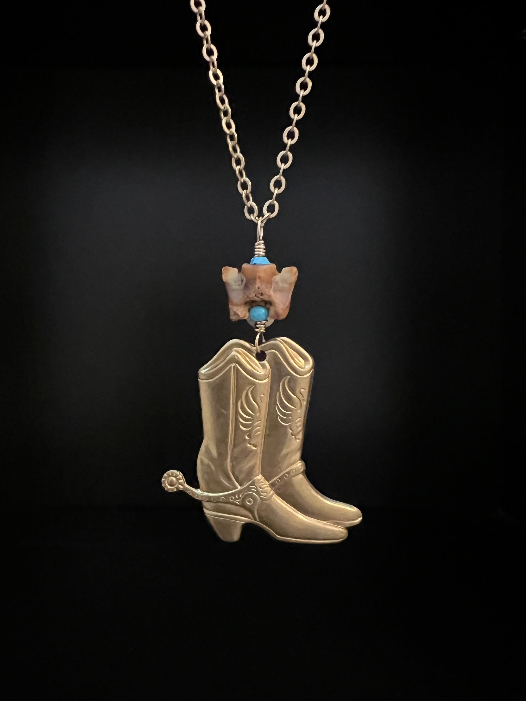 Boots with Snake Vertebrae Necklace by Pake