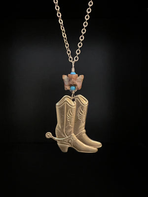 Boots with Snake Vertebrae Necklace by Pake