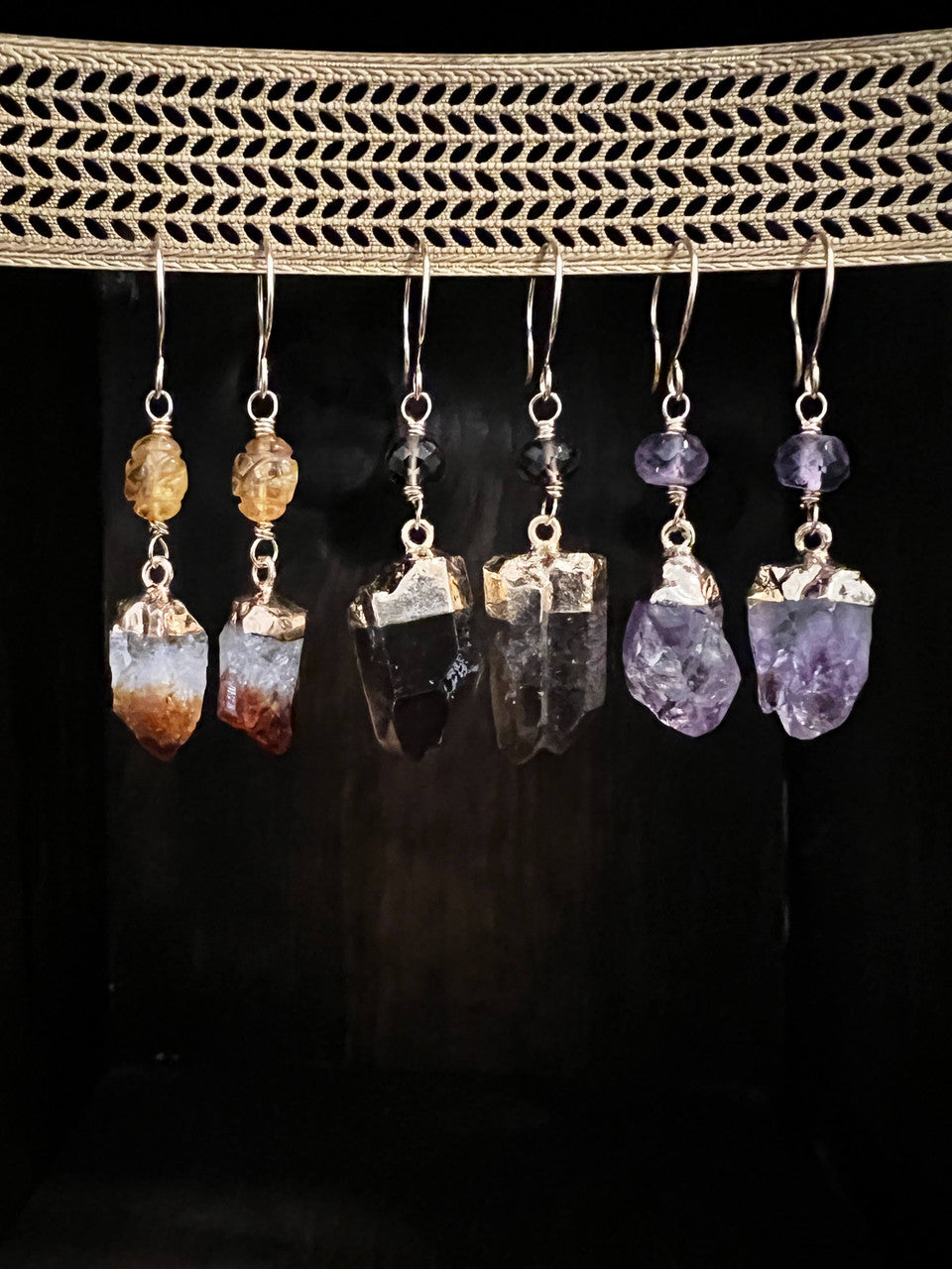 Electroplated Amethyst, Black Tourmaline, Blue Kyanite, Citrine, Selenite and Smoky Quartz with semi precious accent stones hanging on hand made gold filled ear wires.