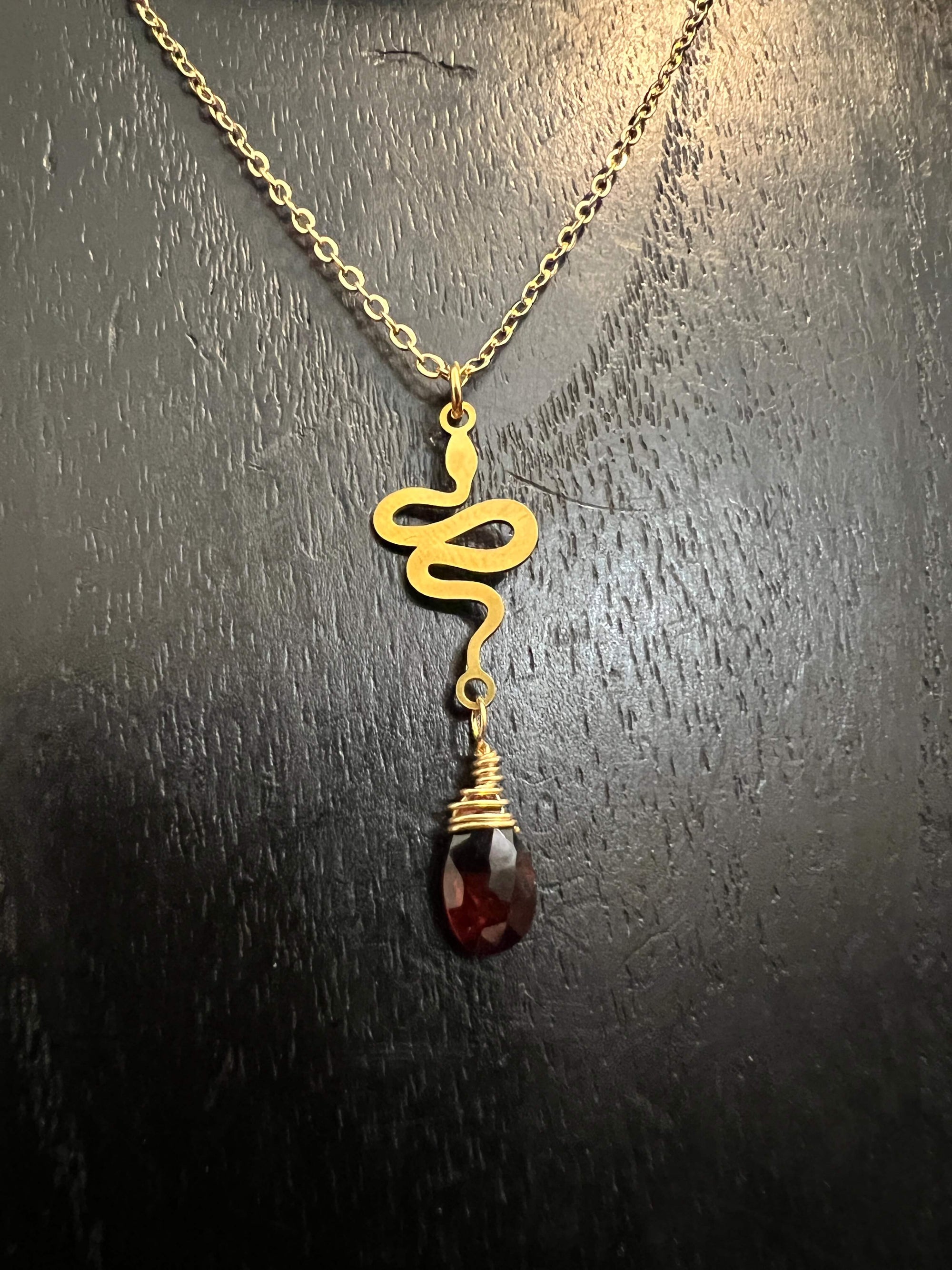 Tiny Snake and Garnet Necklace by Pake