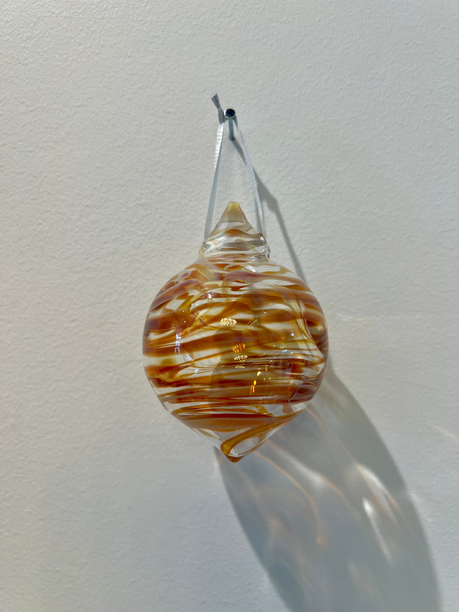 Amber Rake Glass Christmas Ornament by Steve Vaught