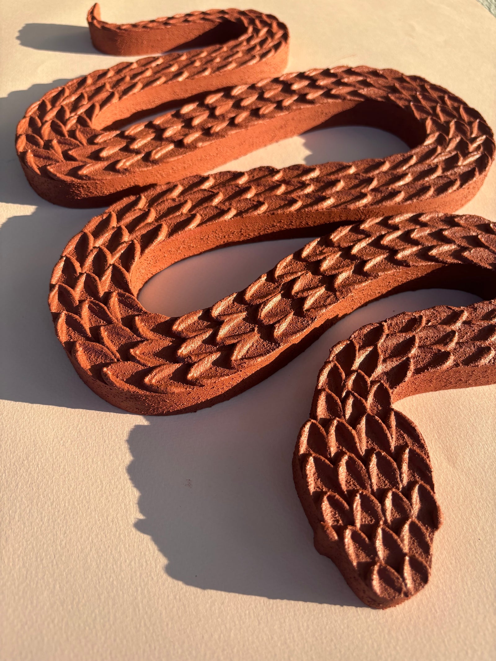 Terracotta Snake by Clarissa Sylva