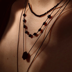 O N Y X + Silk
All Vibe necklaces are handcrafted with natural gemstones and silk.