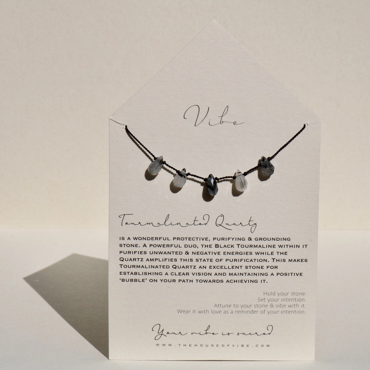 TOURMALINATED QUARTZ
is an effective grounding stone excellent at releasing tensions at any level. Harmonizing opposite elements, it turns negative thoughts into positive ones. It is also said to provide protection while traveling.