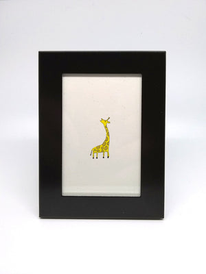 Giraffe Print by Elisa Wikey - Framed paper print. Are you an ant? Or do you live in a very small house? Or perhaps you just like charming tiny things? Hurray, finally something that fits your lifestyle! This is a 2.5"x3.5" tiny framed thing, the tiniest and framiest of all the things.