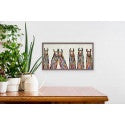 These lovable llamas are posing just for you in this colorful wall art by Eli Halpin. Beautiful streaks of rainbow lay across their furry necks, and each one is sweetly smiling your way. This animal decor would be a fun addition to any space.