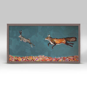 The Chase Mini Framed Canvas Print by Eli Halpin