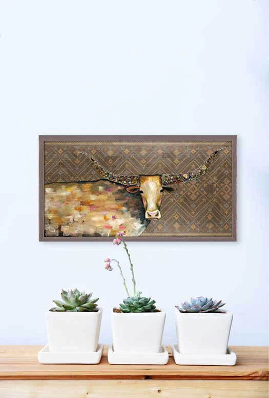 A trendy and contemporary longhorn stands out on this animal art by Eli Halpin. Miniature versions of our signature canvas wall art are each framed with a rustic wood finish. These can be collected individually, or in a curated series to create a custom gallery wall.